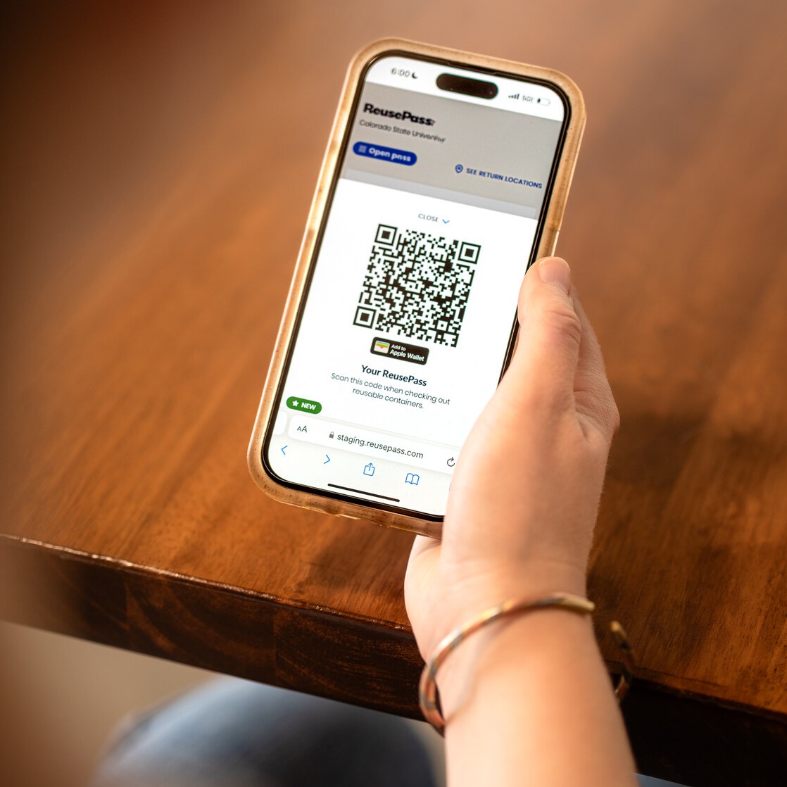 ReusePass app QR code on a phone